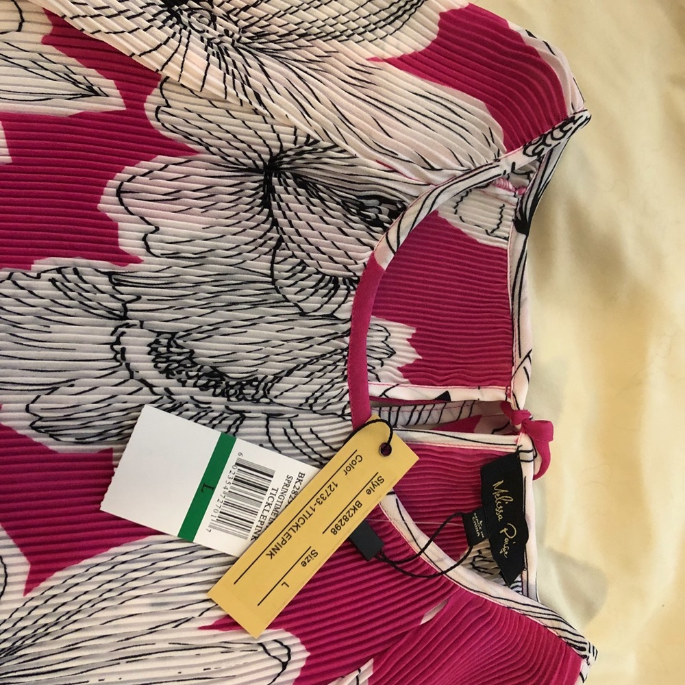 Gorgeous pink cold shoulder top. NWT